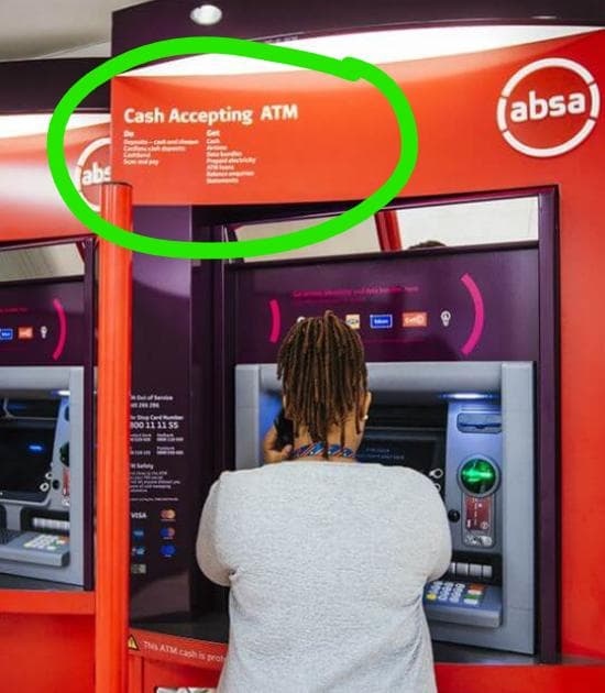 With cash at an Absa ATM